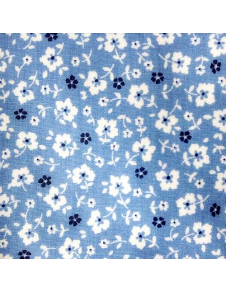 tissu blanc ciel avec des fleurs de myosotis bleu marine et blanches